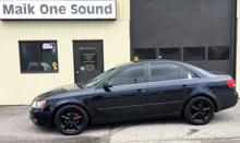 2006 Hyundai Sonata with professional window tint in North Bay